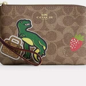 NWT Coach Corner Zip Wristlet In Signature Canvas With Sticker Print Rexy TRex